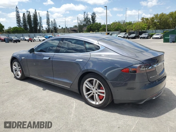 2014 Tesla Model S 60 with VIN 5YJSA1S13EFP63432, listed as a Copart auction lot 56706195 with 114,671 mi miles and Clean Title. Bid and sale history available at DreamBid. Image 2.