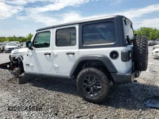 2021 Jeep Wrangler Unlimited Willys with VIN 1C4HJXDG3MW752441, listed as a Copart auction lot 55881925 with 61,751 mi miles and Salvage title. Bid and sale history available at DreamBid. Image 2.