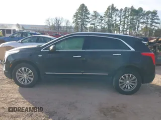 2019 Cadillac XT5 Luxury FWD z VIN 1GYKNCRSXKZ102866, wystawiony jako IAAI lot #41335840 z przebiegiem 59 563 mil mil oraz . Historia ofert i sprzedaży dostępna na DreamBid. Obrazek 14.