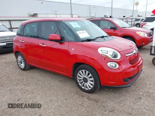 2014 FIAT 500L Easy z VIN ZFBCFABH0EZ019450, wystawiony jako IAAI lot #42522930 z przebiegiem 106 679 mil mil oraz . Historia ofert i sprzedaży dostępna na DreamBid. Obrazek 1.