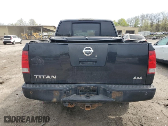 2012 Nissan Titan SV with VIN 1N6AA0EJ2CN311162, listed as a Copart auction lot 54403125 with 233,662 mi miles and Salvage title. Bid and sale history available at DreamBid. Image 6.