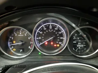 2017 Mazda CX-9 Touring z VIN JM3TCACY8H0138948, wystawiony jako Copart lot #86755594 z przebiegiem 89 828 mil mil oraz Szkoda całkowita • Salvage title. Historia ofert i sprzedaży dostępna na DreamBid. Obrazek 9.