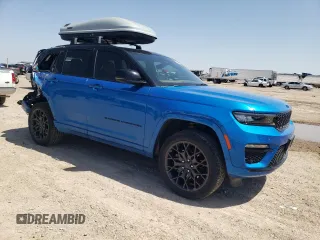 2023 Jeep Grand Cherokee Summit Reserve with VIN 1C4RJYE60P8881133, listed as a Copart auction lot 52354915 with 31,739 mi miles and Salvage title. Bid and sale history available at DreamBid. Image 4.
