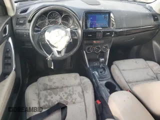 2014 Mazda CX-5 Touring with VIN JM3KE2CY9E0336218, listed as a Copart auction lot 49213255 with 124,749 mi miles and Salvage Title. Bid and sale history available at carsss.com. Image 8.