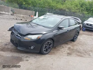 2012 Ford Focus Titanium with VIN 1FAHP3J2XCL369554, listed as a IAAI auction lot 42072931 with 95,474 mi miles. Bid and sale history available at carsss.com. Image 2.
