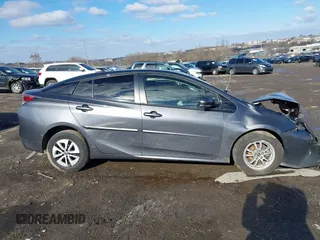 2018 Toyota Prius Two z VIN JTDKARFU4J3056141, wystawiony jako IAAI lot #41525929 z przebiegiem 127 414 mil mil oraz . Historia ofert i sprzedaży dostępna na DreamBid. Obrazek 13.