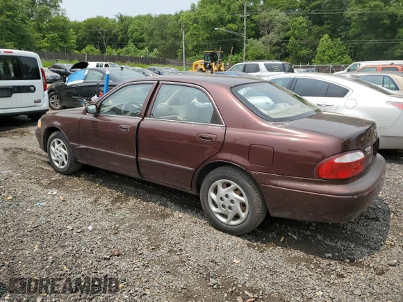 2000 Mazda 626 LX z VIN 1YVGF22C4Y5112874, wystawiony jako Copart lot #58952175 z przebiegiem 100 070 mil mil oraz Szkoda całkowita • Salvage title. Historia ofert i sprzedaży dostępna na DreamBid. Obrazek 2.