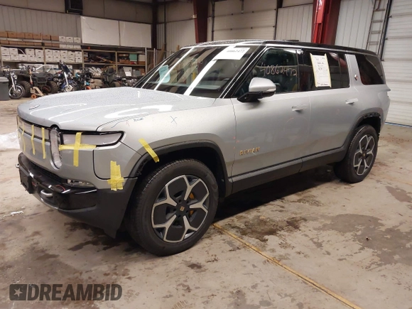 2024 Rivian R1S Adventure with VIN 7PDSGABA9RN039601, listed as a IAAI auction lot 40862472 with 6,186 mi miles. Bid and sale history available at carsss.com. Image 23.
