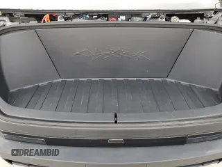 2024 Tesla Cybertruck z VIN 7G2CEHED4RA013156, wystawiony jako Copart lot #77332004 z przebiegiem 1 808 mil mil oraz Nie do naprawy • Non repairable. Historia ofert i sprzedaży dostępna na DreamBid. Obrazek 11.