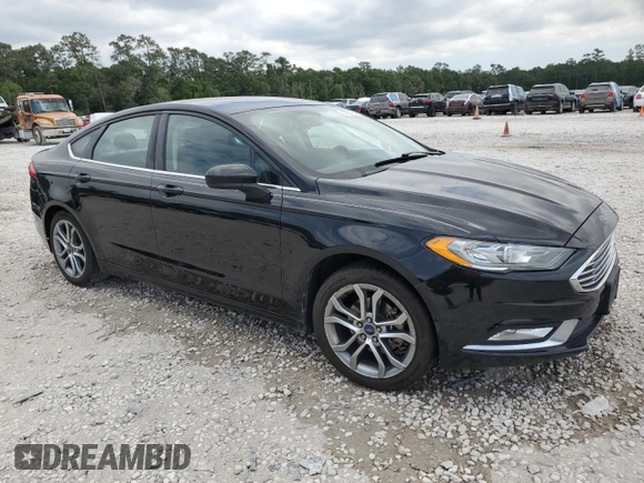 2017 Ford Fusion SE z VIN 3FA6P0H75HR228505, wystawiony jako Copart lot #53251205 z przebiegiem 144 898 mil mil oraz Czysty tytuł • Clean title. Historia ofert i sprzedaży dostępna na DreamBid. Obrazek 4.