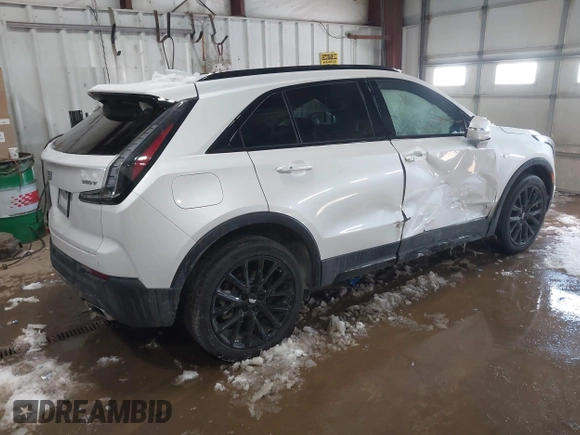 2023 Cadillac XT4 AWD Sport with VIN 1GYFZFR42PF111269, listed as a IAAI auction lot 41614455 with 21,866 mi miles. Bid and sale history available at carsss.com. Image 4.