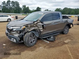 2020 Honda Ridgeline RTL-E with VIN 5FPYK3F79LB001891, listed as a Copart auction lot 58569255 with 34,513 mi miles and Salvage title. Bid and sale history available at DreamBid. Image 1.