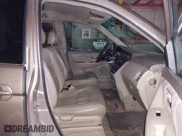 2003 Honda Odyssey EX-L with VIN 5FNRL18923B117592, listed as a IAAI auction lot 41546119 with 212,755 mi miles and . Bid and sale history available at DreamBid. Image 5.