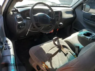 2000 Ford F-150 XL with VIN 1FTZX172XYNC01869, listed as a Copart auction lot 47414095 with 0 mi miles and Salvage Title. Bid and sale history available at carsss.com. Image 8.