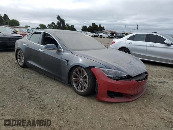 2016 Tesla Model S 90D z VIN 5YJSA1E41GF171522, wystawiony jako Copart lot #59966545 z przebiegiem Nie podano mil oraz Szkoda całkowita • Salvage title. Historia ofert i sprzedaży dostępna na DreamBid. Obrazek 4.