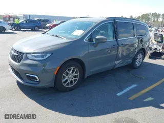 2022 Chrysler Pacifica Touring L with VIN 2C4RC1BG2NR118014, listed as a IAAI auction lot 41869586 with 87,689 mi miles. Bid and sale history available at carsss.com. Image 2.