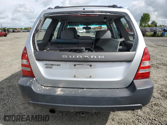 2005 Subaru Forester X с VIN JF1SG63685H705778, выставлен на аукционе Copart как лот 52918554 с пробегом 116 913 миль миль и Списание • Salvage title. История ставок и продаж доступна на DreamBid. Изображение 6.