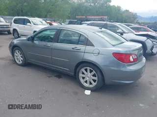 2007 Chrysler Sebring Touring z VIN 1C3LC56R17N521091, wystawiony jako IAAI lot #42202185 z przebiegiem 128 726 mil mil oraz . Historia ofert i sprzedaży dostępna na DreamBid. Obrazek 3.