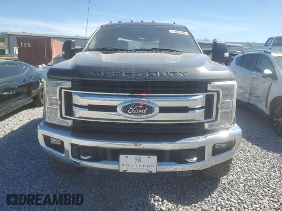 2017 Ford Super Duty F-250 SRW Lariat with VIN 1FT7W2BT0HED14889, listed as a Copart auction lot 47591825 with 219,807 mi miles and Salvage Title. Bid and sale history available at carsss.com. Image 5.