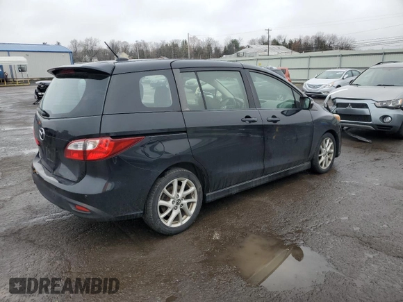 2015 Mazda 5 Grand Touring z VIN JM1CW2DL4F0187845, wystawiony jako Copart lot #51895575 z przebiegiem 133 464 mil mil oraz Szkoda całkowita • Salvage title. Historia ofert i sprzedaży dostępna na DreamBid. Obrazek 3.