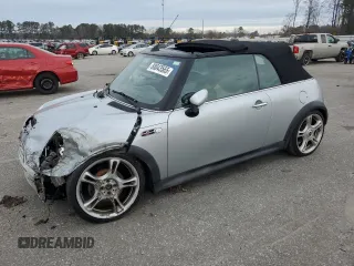 2005 MINI Convertible S with VIN WMWRH33575TK56034, listed as a Copart auction lot 88043565 with 33,410 mi miles and Salvage Title. Bid and sale history available at DreamBid. Image 1.