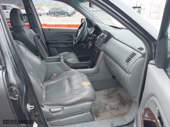 2004 Honda Pilot EX with VIN 2HKYF18644H516791, listed as a IAAI auction lot 41876348 with 291,358 mi miles. Bid and sale history available at carsss.com. Image 5.
