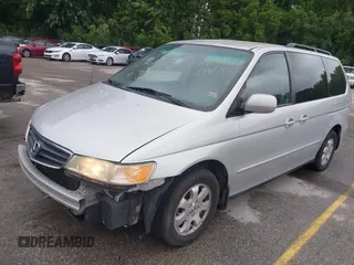 2004 Honda Odyssey EX-L with VIN 5FNRL18934B076486, listed as a IAAI auction lot 42315160 with 209,467 mi miles and . Bid and sale history available at DreamBid. Image 2.