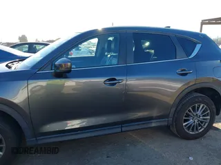 2017 Mazda CX-5 Touring with VIN JM3KFBCL2H0165625, listed as a IAAI auction lot 41879145 with 64,745 mi miles. Bid and sale history available at carsss.com. Image 14.