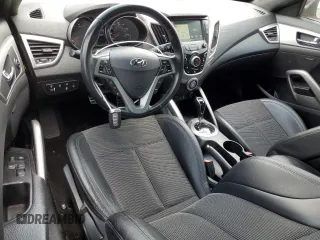2016 Hyundai Veloster z VIN KMHTC6AD4GU294400, wystawiony jako Copart lot #52755575 z przebiegiem 108 419 mil mil oraz Szkoda całkowita • Salvage title. Historia ofert i sprzedaży dostępna na DreamBid. Obrazek 8.
