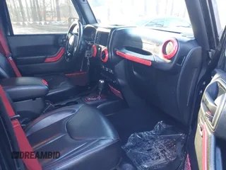 2017 Jeep Wrangler Unlimited Rubicon Recon z VIN 1C4BJWFG4HL723096, wystawiony jako IAAI lot #41393584 z przebiegiem 102 045 mil mil oraz . Historia ofert i sprzedaży dostępna na DreamBid. Obrazek 5.