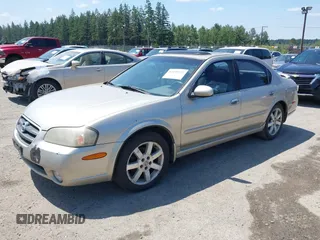 2002 Nissan Maxima GXE z VIN JN1DA31D92T207069, wystawiony jako IAAI lot #42439722 z przebiegiem 188 502 mil mil oraz . Historia ofert i sprzedaży dostępna na DreamBid. Obrazek 2.