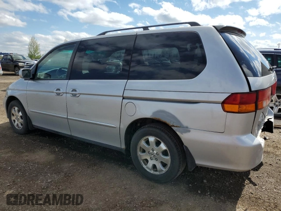 2002 Honda Odyssey EX with VIN 2HKRL186X2H006763, listed as a Copart auction lot 57317075 with 282,090 mi miles and Salvage title. Bid and sale history available at DreamBid. Image 2.