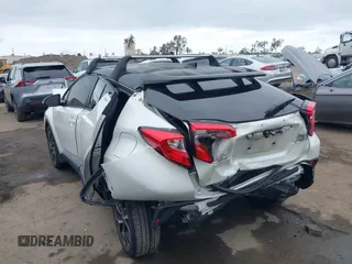 2020 Toyota C-HR LE with VIN JTNKHMBX9L1092934, listed as a IAAI auction lot 42021972 with 56,777 mi miles and . Bid and sale history available at DreamBid. Image 3.