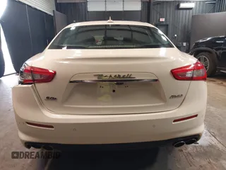2020 Maserati Ghibli S Q4 z VIN ZAM57YTAXL1354588, wystawiony jako IAAI lot #42337502 z przebiegiem 60 681 mil mil oraz . Historia ofert i sprzedaży dostępna na DreamBid. Obrazek 16.