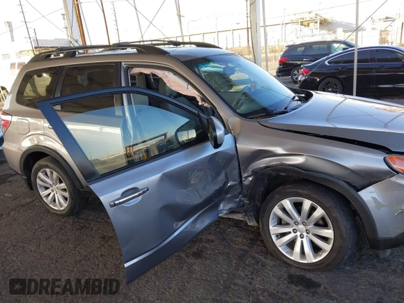 2011 Subaru Forester X Limited with VIN JF2SHAEC5BH757458, listed as a IAAI auction lot 41059097 with 133,662 mi miles and . Bid and sale history available at DreamBid. Image 6.