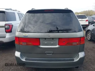 2000 Honda Odyssey EX with VIN 2HKRL1864YH596967, listed as a IAAI auction lot 41976363 with 146,411 mi miles and . Bid and sale history available at DreamBid. Image 16.