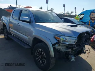2020 Toyota Tacoma SR5 z VIN 3TMAZ5CN8LM126770, wystawiony jako IAAI lot #41644091 z przebiegiem 49 299 mil mil oraz . Historia ofert i sprzedaży dostępna na DreamBid. Obrazek 1.