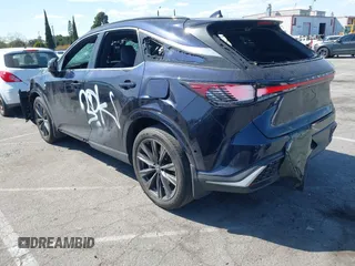 2023 Lexus RX 350 with VIN 2T2BAMCA3PC017131, listed as a IAAI auction lot 41965100 with 23,344 mi miles and . Bid and sale history available at DreamBid. Image 3.