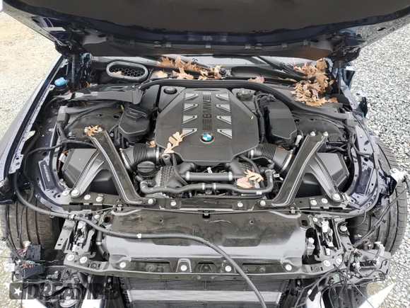 2023 BMW 7 Series 760i xDrive with VIN WBA33EJ04PCN52350, listed as a Copart auction lot 44487295 with 10,878 mi miles and Salvage title. Bid and sale history available at DreamBid. Image 11.