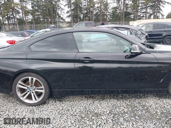 2014 BMW 4 Series 428i with VIN WBA3N3C50EK230489, listed as a IAAI auction lot 41613944 with 86,553 mi miles and . Bid and sale history available at DreamBid. Image 14.