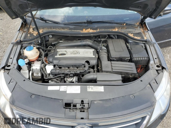 2012 Volkswagen CC Sport с VIN WVWMN7AN3CE504605, выставлен на аукционе Copart как лот 57232585 с пробегом 96 362 миль миль и Списание • Salvage title. История ставок и продаж доступна на DreamBid. Изображение 11.