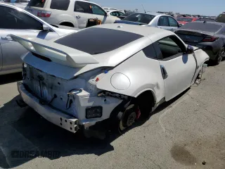 2016 Nissan 370Z with VIN JN1AZ4EH0GM933290, listed as a Copart auction lot 62025304 with 100,275 mi miles and Salvage Title. Bid and sale history available at carsss.com. Image 3.