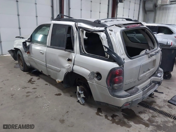 2005 Chevrolet TrailBlazer LT with VIN 1GNDT13SX52357796, listed as a IAAI auction lot 41510963 with 218,766 mi miles. Bid and sale history available at carsss.com. Image 3.