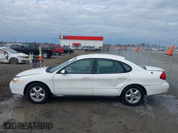 2002 Ford Taurus SES Standard with VIN 1FAFP55U12A184513, listed as a IAAI auction lot 41125306 with 241,896 mi miles. Bid and sale history available at carsss.com. Image 14.