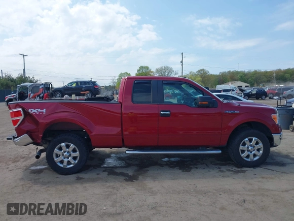 2014 Ford F-150 XL with VIN 1FTFX1EFXEFC28469, listed as a IAAI auction lot 42215331 with 198,139 mi miles and . Bid and sale history available at DreamBid. Image 13.