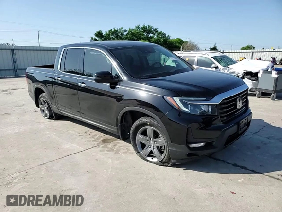 2023 Honda Ridgeline RTL-E with VIN 5FPYK3F72PB001592, listed as a Copart auction lot 52154625 with 41,153 mi miles and Salvage title. Bid and sale history available at DreamBid. Image 11.