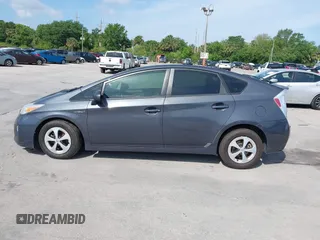 2012 Toyota Prius One z VIN JTDKN3DU4C1591831, wystawiony jako IAAI lot #41918102 z przebiegiem 167 443 mil mil oraz . Historia ofert i sprzedaży dostępna na DreamBid. Obrazek 14.