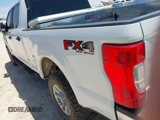 2020 Ford F-250 XL with VIN 1FT7W2BT2LED60958, listed as a IAAI auction lot 42661421 with 107,199 mi miles and . Bid and sale history available at DreamBid. Image 3.