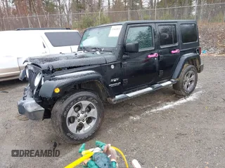 2016 Jeep Wrangler Unlimited 75th Anniversary with VIN 1C4HJWEG3GL181371, listed as a IAAI auction lot 41864965 with 64,259 mi miles and . Bid and sale history available at DreamBid. Image 17.