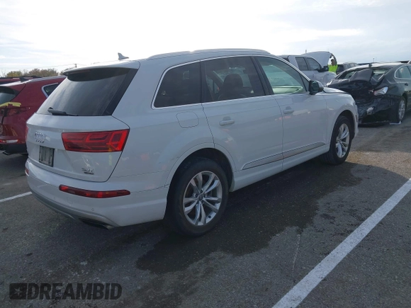 2017 Audi Q7 Premium Plus with VIN WA1LAAF78HD041060, listed as a IAAI auction lot 40892654 with 172,005 mi miles and . Bid and sale history available at DreamBid. Image 4.